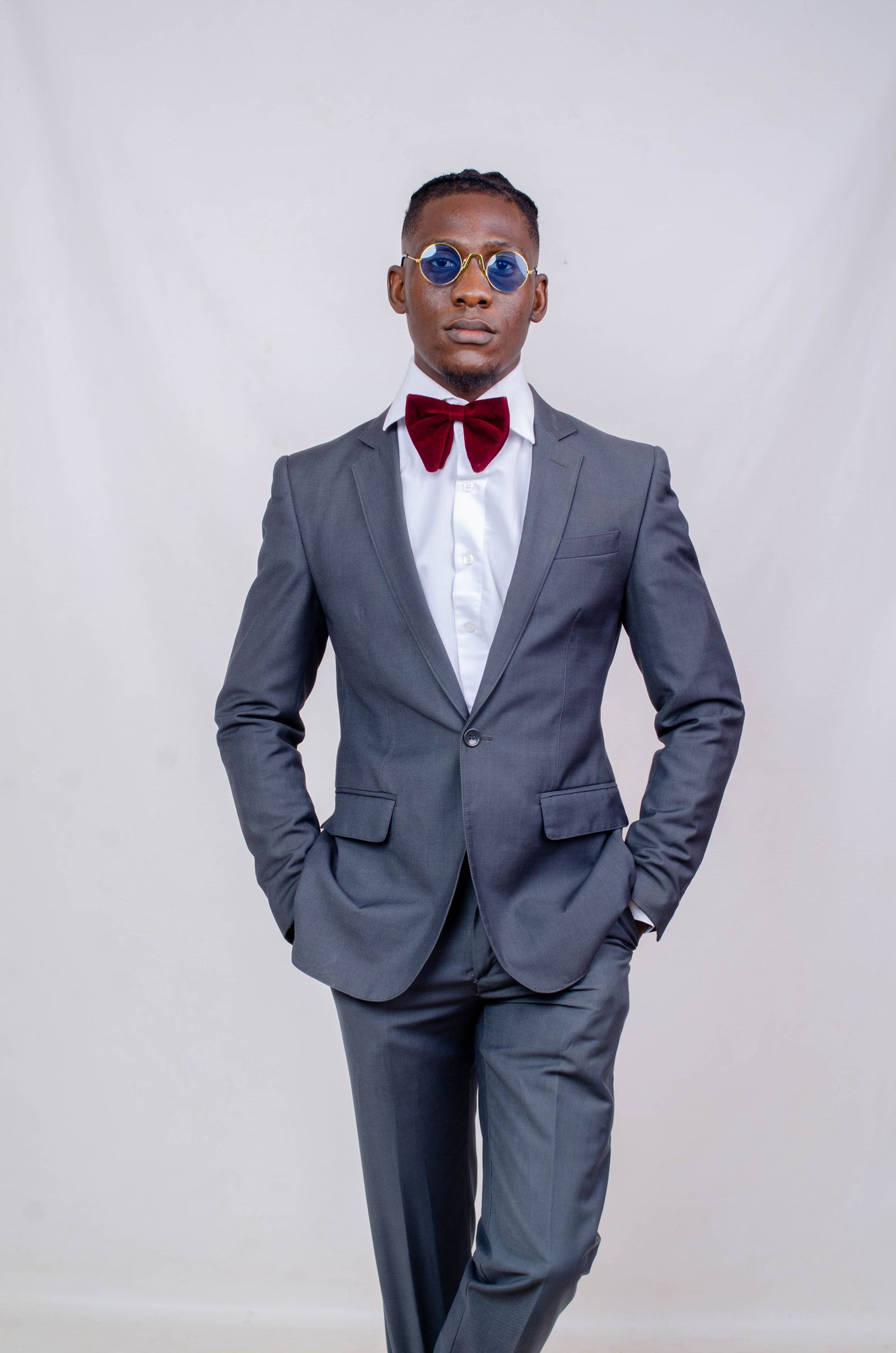 Prom Suit & Dress Hire | Blackpool & Fylde Coast 1 Young man in a tailored suit and bow tie — prom suit hire, Fylde Coast Formal Attire